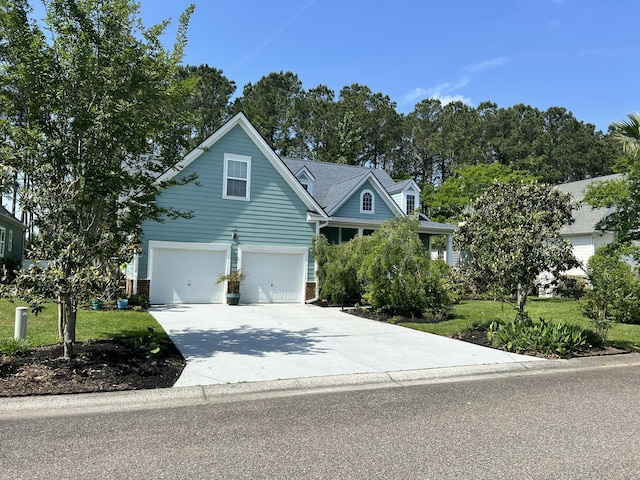 view of front of property with a garage, concrete driveway, a front lawn, and brick siding