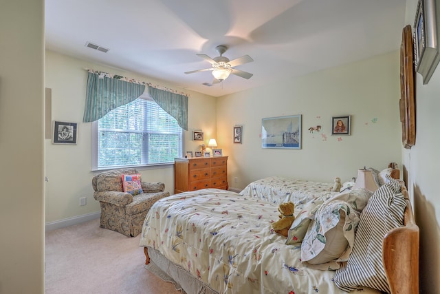 bedroom featuring baseboards, ceiling fan, carpet, and visible vents