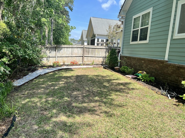 view of yard featuring fence