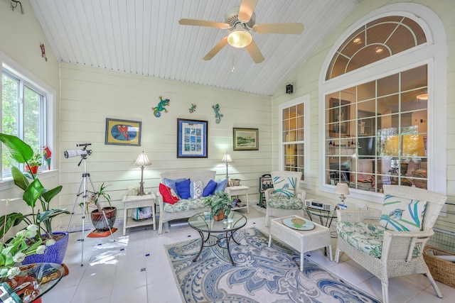 sunroom / solarium with ceiling fan and outdoor lounge area