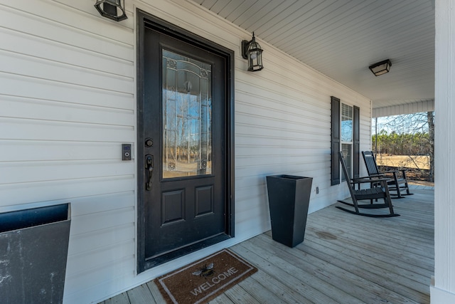 entrance to property with covered porch