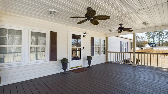 wooden deck with ceiling fan