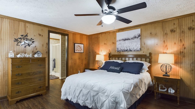 bedroom featuring ornamental molding, dark wood-type flooring, ceiling fan, and a textured ceiling