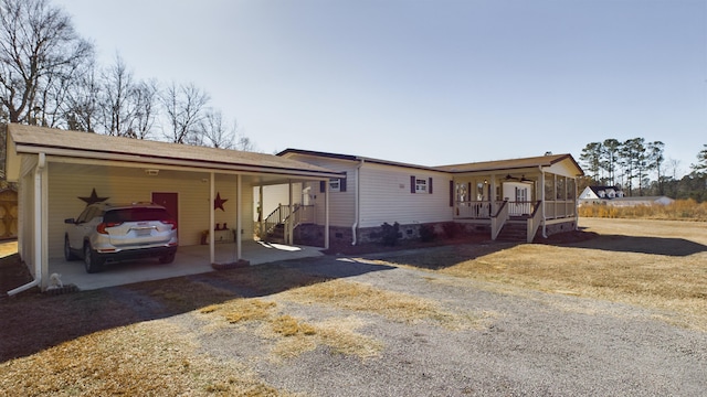 view of front facade with a carport and a porch