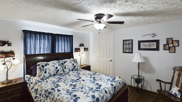 bedroom featuring ceiling fan, hardwood / wood-style floors, and a textured ceiling