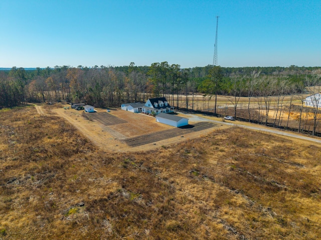 view of storm shelter with a rural view