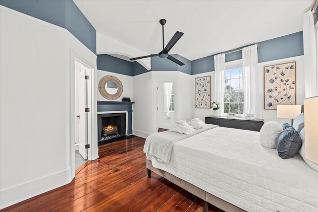 bedroom featuring dark wood-type flooring and ceiling fan