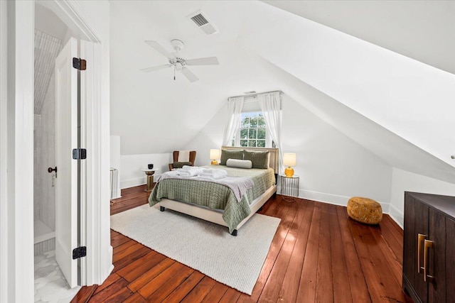 bedroom featuring ceiling fan, lofted ceiling, and wood-type flooring