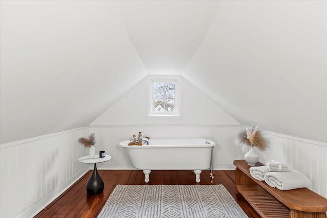 interior space with lofted ceiling and light wood-type flooring