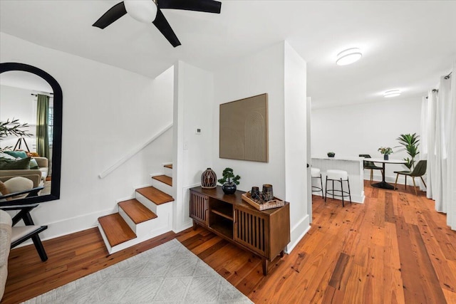 interior space featuring hardwood / wood-style flooring and ceiling fan