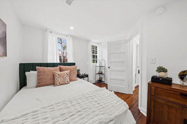 bedroom featuring dark hardwood / wood-style floors