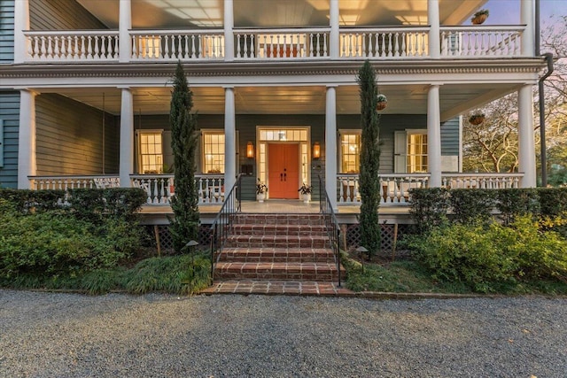 entrance to property featuring a porch