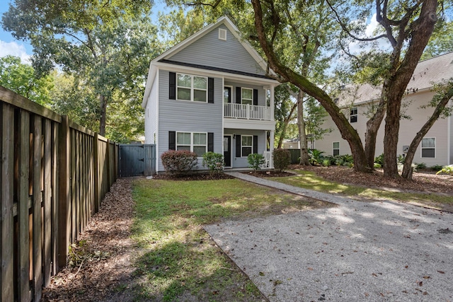 view of property with a front lawn