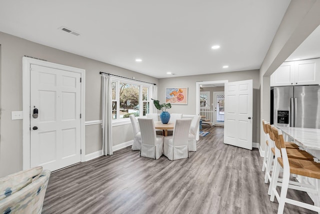 dining area featuring light hardwood / wood-style flooring