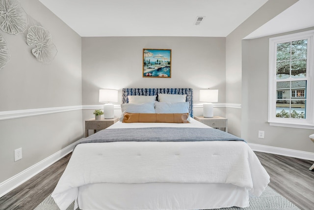 bedroom featuring hardwood / wood-style floors