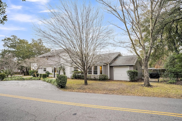 single story home with a garage