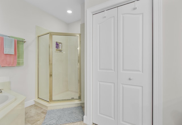 1647 Marsh Harbor Ln, Mount Pleasant, SC 29464 - bathroom featuring a stall shower, a closet, a garden tub, recessed lighting, and baseboards