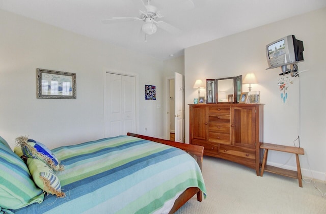 1647 Marsh Harbor Ln, Mount Pleasant, SC 29464 - bedroom with light colored carpet, a closet, a ceiling fan, and baseboards