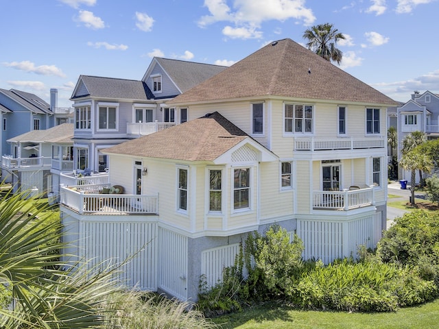 1647 Marsh Harbor Ln, Mount Pleasant, SC 29464 - back of property featuring a balcony and roof with shingles