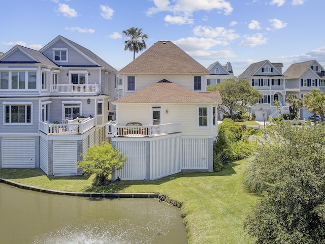 1647 Marsh Harbor Ln, Mount Pleasant, SC 29464 - rear view of property with a water view, a lawn, and a balcony