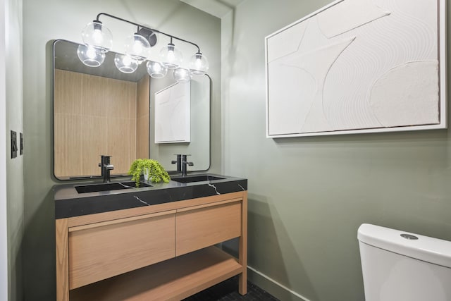 1366 W Point Dr, Mount Pleasant, SC 29466 - bathroom featuring toilet, vanity, and baseboards