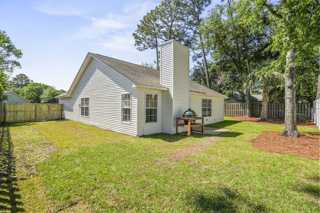 1366 W Point Dr, Mount Pleasant, SC 29466 - rear view of property with a chimney and roof with shingles
