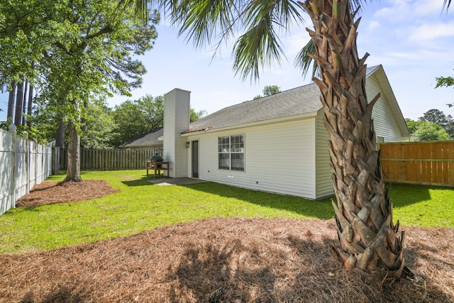 1366 W Point Dr, Mount Pleasant, SC 29466 - back of property with a patio area and a chimney