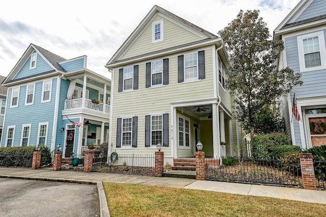 view of front of home featuring a balcony and covered porch