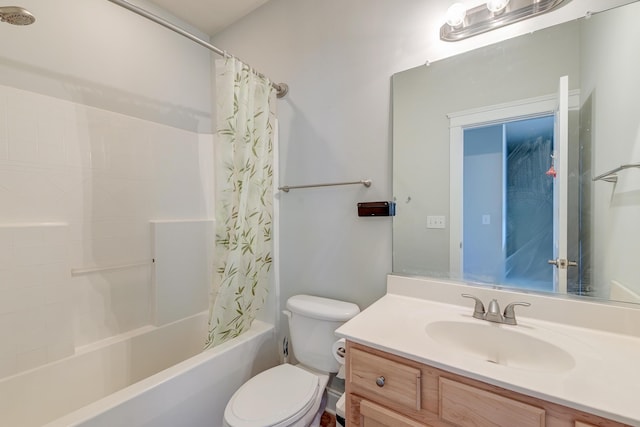 full bathroom with vanity, shower / tub combo, and toilet