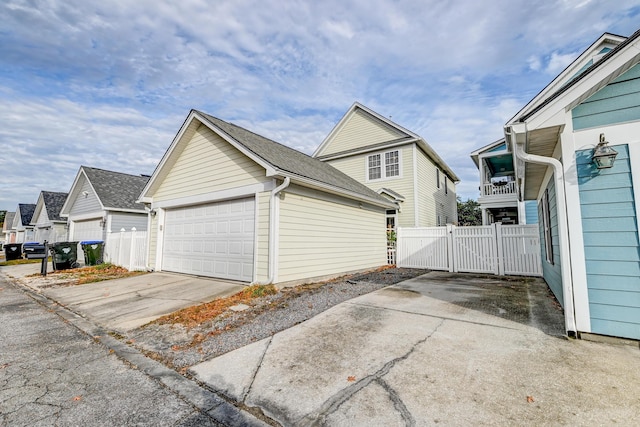 view of property exterior with a garage