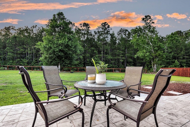 view of patio terrace at dusk
