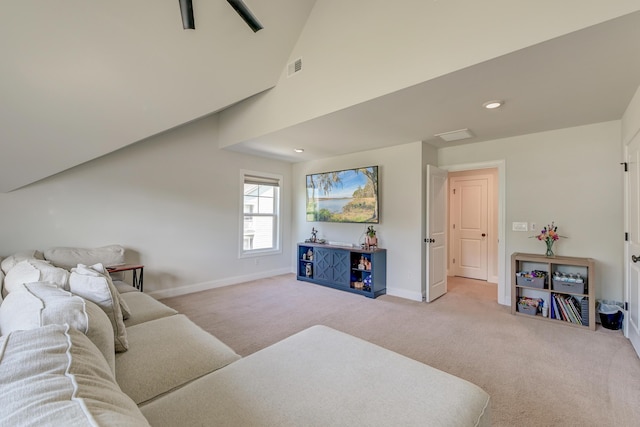 carpeted living room featuring baseboards