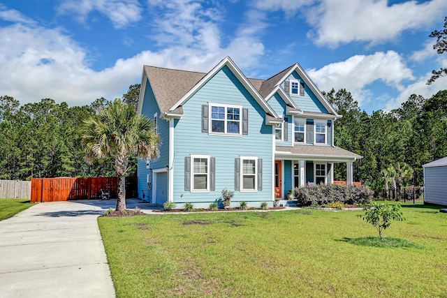 view of front of house with covered porch, driveway, and an attached garage