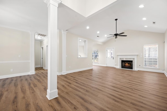 unfurnished living room with dark hardwood / wood-style floors, ceiling fan, and high vaulted ceiling