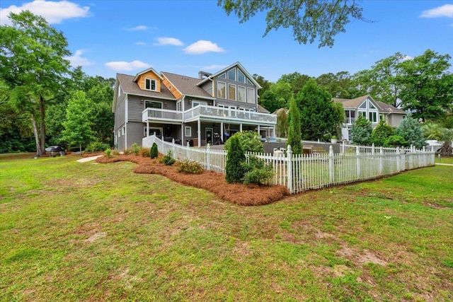 rear view of house with a balcony