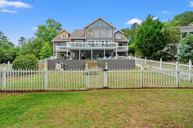 back of house with a wooden deck