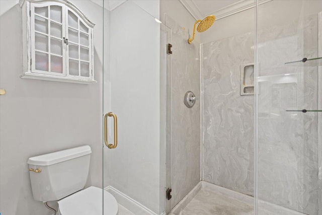 bathroom featuring toilet and a stall shower