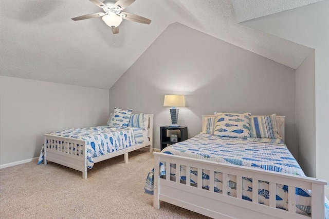 bedroom with lofted ceiling, carpet floors, a textured ceiling, ceiling fan, and baseboards