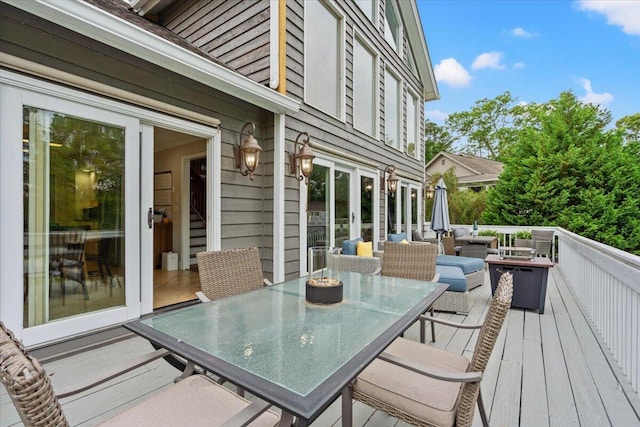 deck featuring outdoor dining space