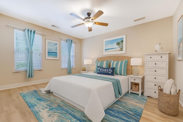 9117 Woodcreek Ct, North Charleston, SC 29406 - bedroom featuring wood finished floors and ceiling fan