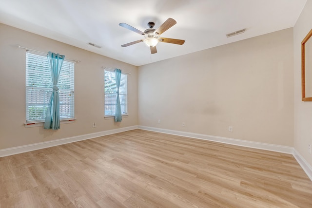 9117 Woodcreek Ct, North Charleston, SC 29406 - spare room featuring light wood-type flooring and a ceiling fan