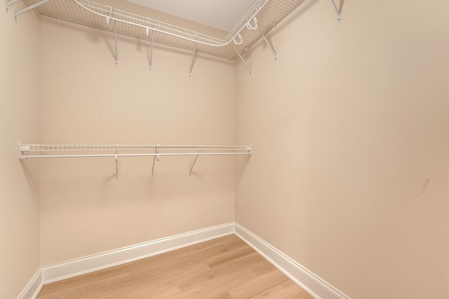 9117 Woodcreek Ct, North Charleston, SC 29406 - spacious closet featuring wood finished floors