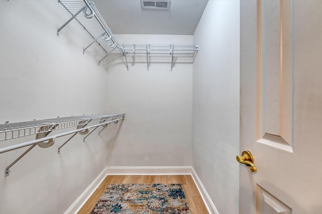9117 Woodcreek Ct, North Charleston, SC 29406 - spacious closet featuring light wood-style flooring