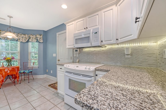 9117 Woodcreek Ct, North Charleston, SC 29406 - kitchen with white appliances, light tile patterned floors, white cabinetry, backsplash, and hanging light fixtures