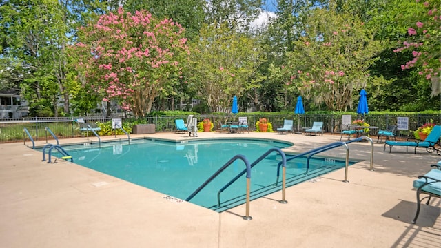 9117 Woodcreek Ct, North Charleston, SC 29406 - community pool featuring a patio