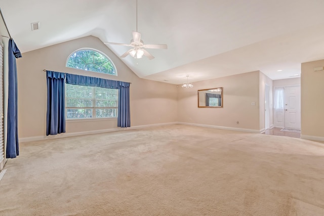 9117 Woodcreek Ct, North Charleston, SC 29406 - empty room featuring ceiling fan, carpet flooring, vaulted ceiling, and a chandelier