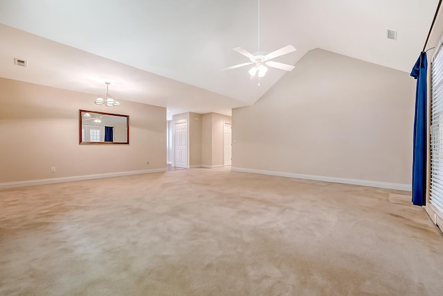 9117 Woodcreek Ct, North Charleston, SC 29406 - unfurnished living room featuring light colored carpet, a chandelier, a ceiling fan, and high vaulted ceiling