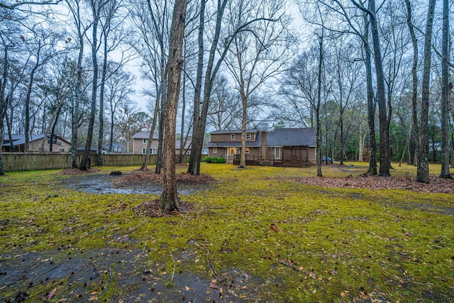 view of yard with fence