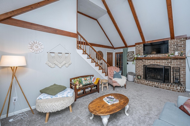 carpeted living room with stairs, beamed ceiling, high vaulted ceiling, and a fireplace