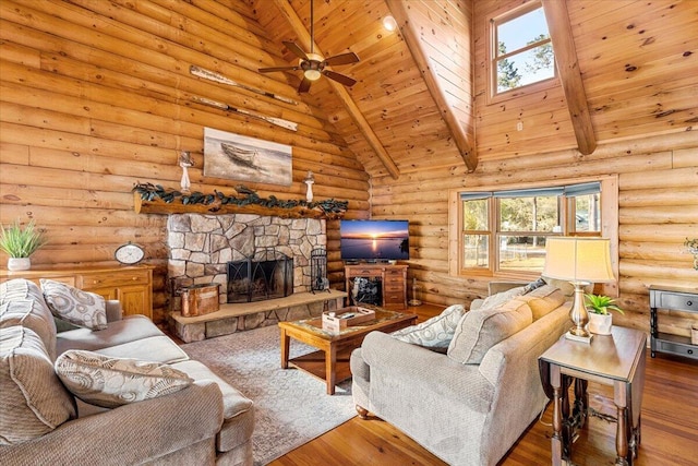 3550 Princess Pond Rd, Summerton, SC 29148 - living room featuring a fireplace, rustic walls, wood finished floors, high vaulted ceiling, and a ceiling fan